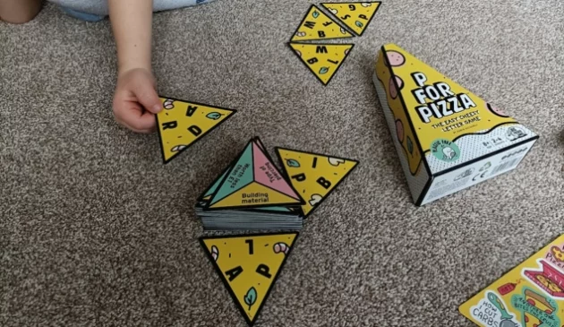 A child playing P for Pizza