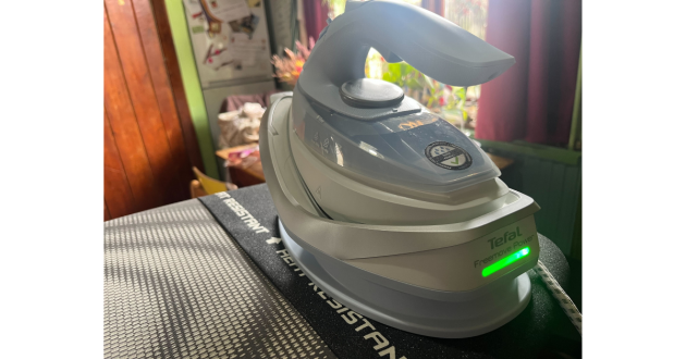 Tefal Freemove Power Cordless Steam Iron being hand tested by journalist Poppy O'Neill