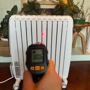 De'Longhi Dragon 4 TRDX41025E Oil Filled Radiator being hand tested by journalist Poppy O'Neill