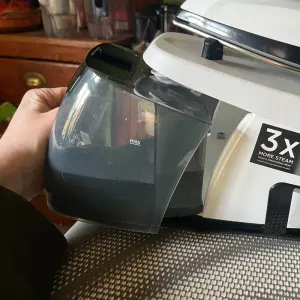 Poppy O'Neill testing the Russell Hobbs Steam Power Steam Generator Iron