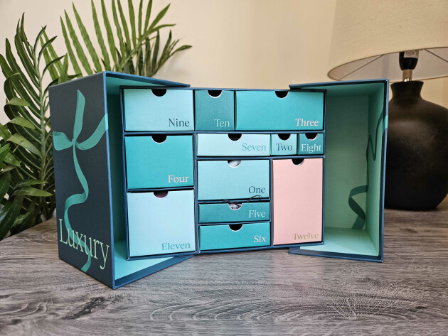 The Boots 12 Days of Luxury Beauty Advent calendar opened up to reveal the 12 drawers