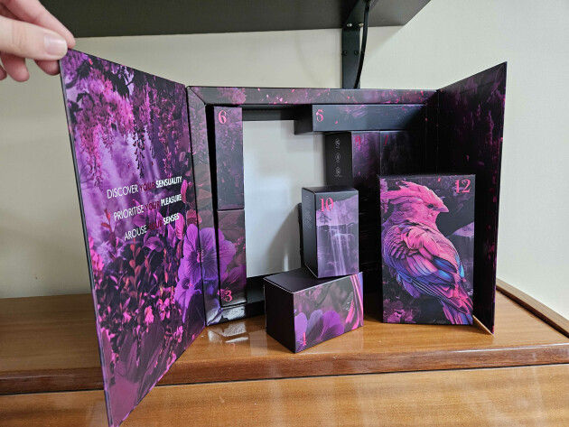 A hand opens Ann Summer's 12 Nights of Wonder Advent calendar