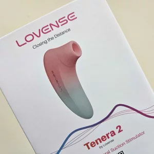 A hand holding the Lovense Tenera 2