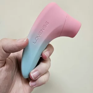 Rebecca Roberts' hand holding the Lovense Tenera 2