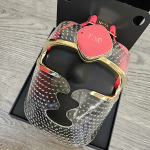 A top view of the FOREO FAQ™ 201 in its case