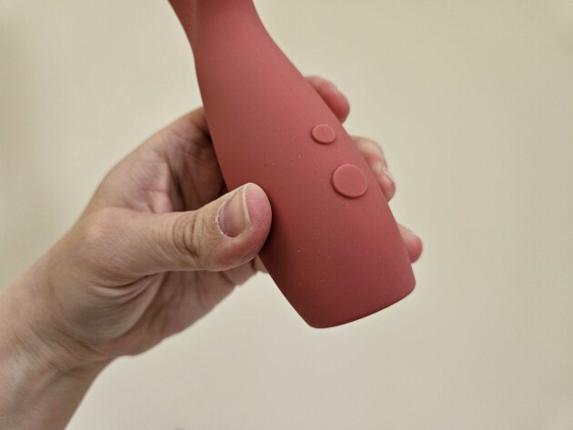 A close up view of the controls on Smile Makers' The Artist rabbit vibrator