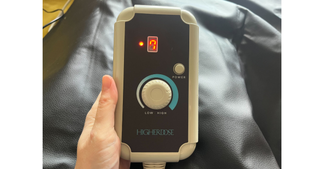 Mumsnet Home editor Poppy O'Neill testing the HigherDOSE Infrared Sauna Blanket