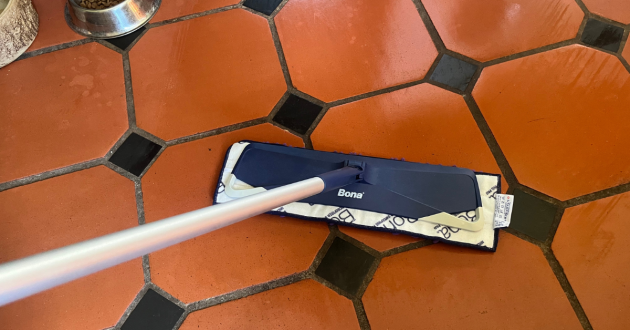 Mumsnet home editor Poppy O'Neill testing the Bona Pet System™ Premium Pet Microfibre Mop