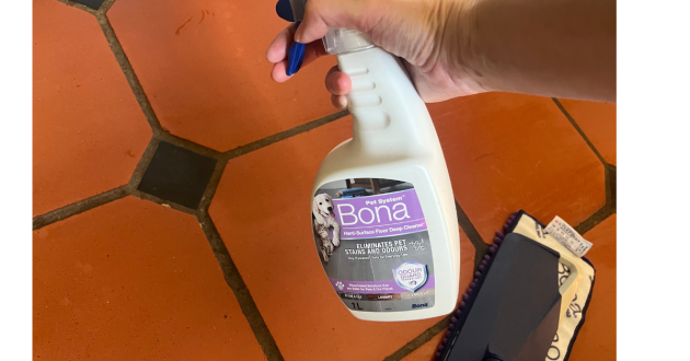 Mumsnet home editor Poppy O'Neill testing the Bona Pet System™ Premium Pet Microfibre Mop