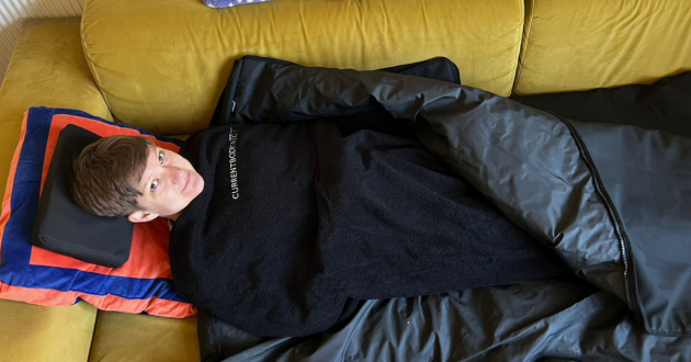 Mumsnet editor Poppy O'Neill testing the CurrentBody Infrared Sauna Blanket