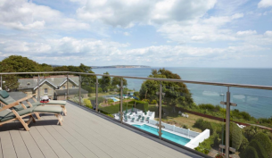 view from a balcony across the sea