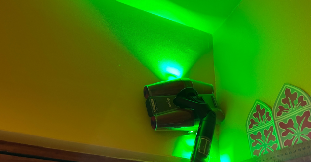 Mumsnet journalist Poppy O'Neill hand testing the Dyson PencilVac Fluffycones