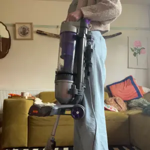 Mumsnet home editor Poppy O'Neill testing the Vax Air Stretch Pet Max