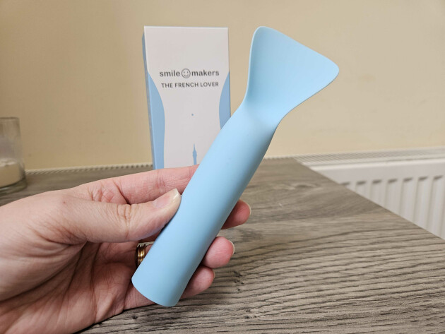 Mumsnet editor Rebecca holds the Smile Makers The French Lover tongue vibrator