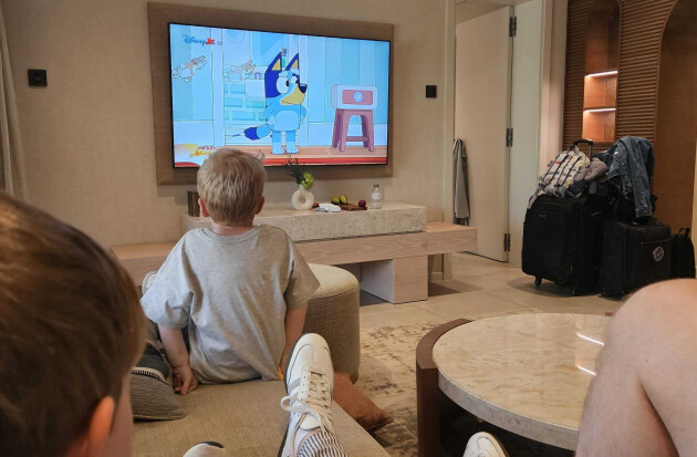 A view of my kids while we're sat on the sofa watching Bluey at ERTH Abu Dhabi hotel