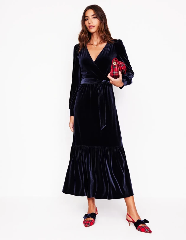 A model wearing Boden's Ophelia velvet midi wrap dress