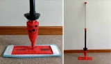 Henry Spray Mop. Picture is split to show the full length of the black and red mop leaning agains a white wall and a close up at the bottom of the mop against the same background which shows a smiley face on a red background on the mop.