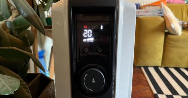 De'Longhi Dragon 4 Oil-Filled Radiator being hand tested by journalist Poppy O'Neill