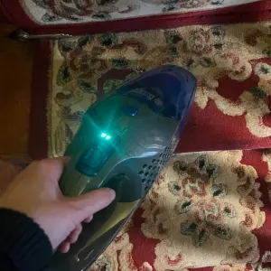 Mumsnet journalist Poppy O'Neill testing the Russell Hobbs Centaur 2 in 1 Cordless Vacuum