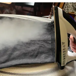 Poppy O'Neill testing the Russell Hobbs Steam Power Steam Generator Iron