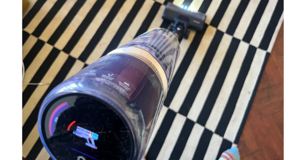 Mumsnet home editor Poppy O'Neill testing the Beldray Airfinity Cordless Vacuum Cleaner