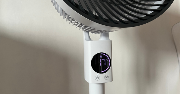 Mumsnet home editor Poppy O'Neill testing the Meaco Sefte Pro Pedestal Air Circulator