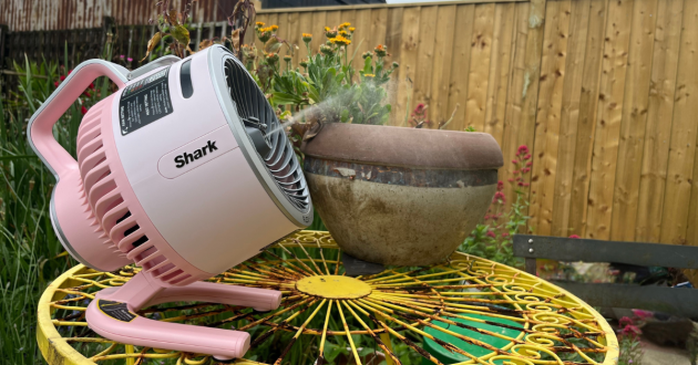 Mumsnet home editor Poppy O'Neill testing the Shark FlexBreeze HydroGo Pro Misting Fan