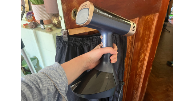 Mumsnet home editor Poppy O'Neill testing the Russell Hobbs Steam Genie VacuSteam