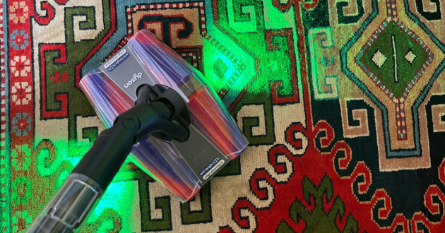 Mumsnet journalist Poppy O'Neill hand testing the Dyson PencilVac Fluffycones