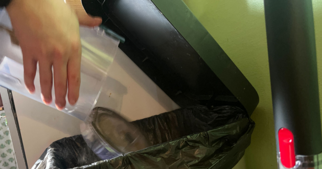 Mumsnet journalist Poppy O'Neill hand testing the Vax LiftOut Reach Pet Design vacuum cleaner