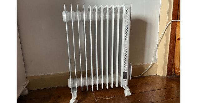 Mumsnet Home editor Poppy O'Neill testing the Morphy Richards HeatFlux Oil Filled Radiator
