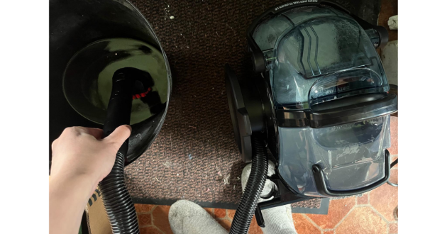 Mumsnet home editor Poppy O'Neill testing the Bissell SpotClean Pro