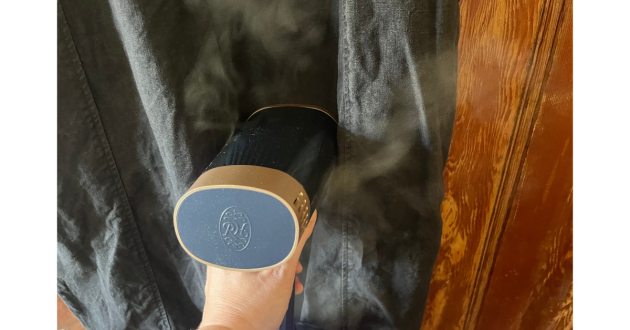 Mumsnet home editor Poppy O'Neill testing the Russell Hobbs Steam Genie VacuSteam