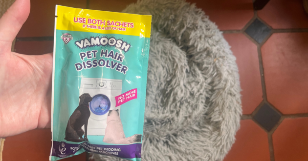 Mumsnet home editor Poppy O'Neill testing the Vamoosh Pet Hair Dissolver and Washing Machine Cleaner