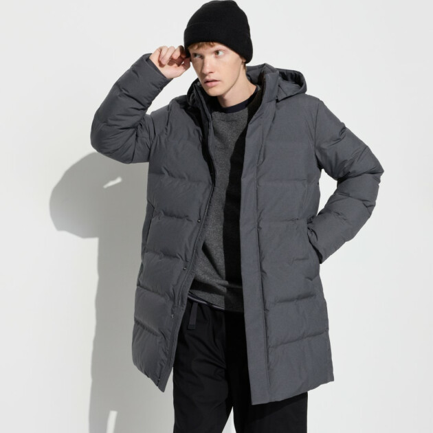 A model wears Uniqlo's Men’s Seamless Down Coat
