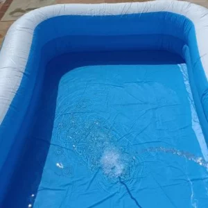 Bestway Family Paddling Pool being filled with a hosepipe