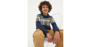 A child model wears FatFace's Blue Fair Isle Yoke Jumper
