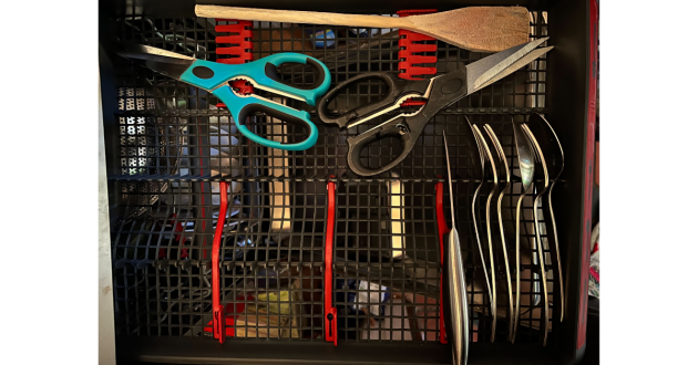 AEG 7000 GlassCare Dishwasher being hand tested by Mumsnet journalist Poppy O'Neill