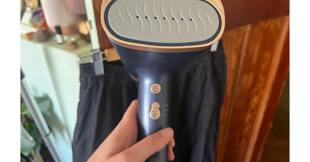 Mumsnet home editor Poppy O'Neill testing the Russell Hobbs Steam Genie VacuSteam