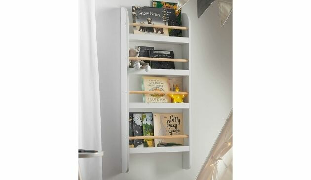 A white bookcase which has been mounted to the wall.