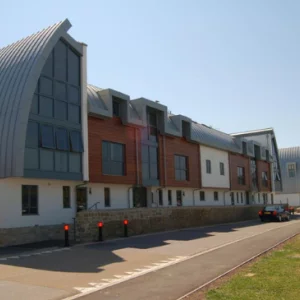 a modern apartment complex on a sunny day