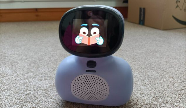 Miko Mini reading a story