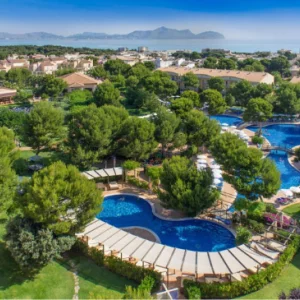 tree-lined swimming pools on a sunny day in Mallorca