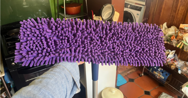 Mumsnet home editor Poppy O'Neill testing the Bona Pet System™ Premium Pet Microfibre Mop