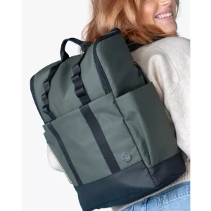 Mum using Babymel Finn changing bag