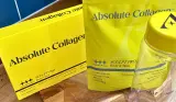 Absolute Collagen SCULPT PRO box, evening powder pouch and clear shaker bottle on a kitchen worktop
