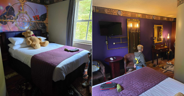 Moon Voyage Room showing the double bed, space-themed wall art, television and seating