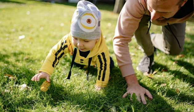 Baby crawling in garden