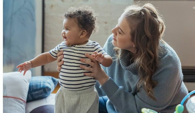 Baby learning to stand
