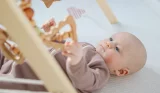 Baby playing with sensory toys